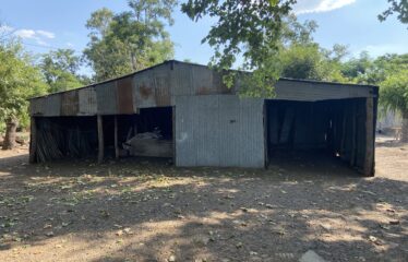 Campo con mejoras en Roque Perez frente ruta 205