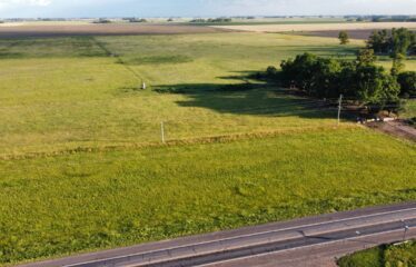 Campo de 24 has. con mejoras en Roque Perez frente ruta 205